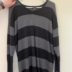 Black and grey sweater.